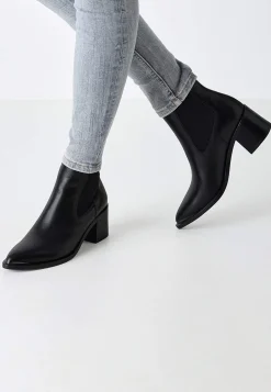 Tamaris Skinnstövlett med spetsig tå Svart Clearance